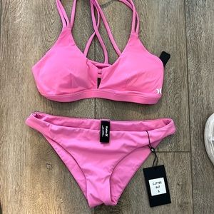 small pink hurley bathing suit